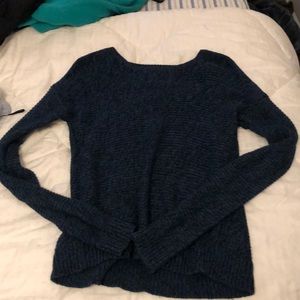 A blue and black sweater